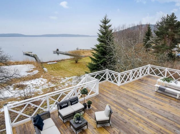 terrasse en bois face au lac suède
