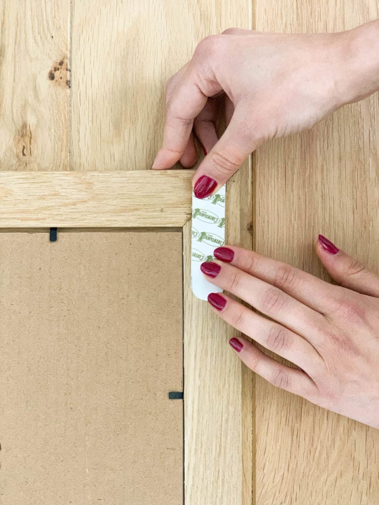 accrocher tableau mur sans trou test languette autocollante