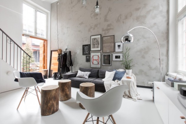 Salon déco intérieur finlandais et matériaux bruts mur en béton ciré.
