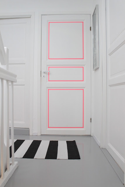 couloir original forme géométrique décoration rose fluo